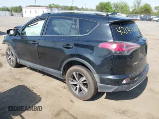 2018 Toyota RAV4 XLE with VIN 2T3WFREVXJW484872, listed as a IAAI auction lot 42144810 with Not provided miles and . Bid and sale history available at DreamBid. Image 3.