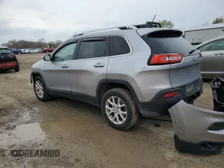 2014 Jeep Cherokee Latitude with VIN 1C4PJLCS5EW169008, listed as a Copart auction lot 51999135 with 180,153 mi miles and Salvage Title. Bid and sale history available at DreamBid. Image 2.