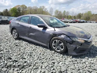 2017 Honda Civic Sedan LX with VIN 2HGFC2F5XHH571696, listed as a Copart auction lot 51995845 with 119,195 mi miles and Salvage Title. Bid and sale history available at carsss.com. Image 4.