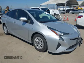 2018 Toyota Prius Two with VIN JTDKBRFU6J3068322, listed as a IAAI auction lot 42001483 with 57,597 mi miles. Bid and sale history available at carsss.com. Image 1.