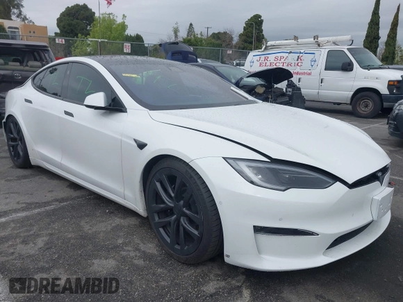 2022 Tesla Model S Plaid with VIN 5YJSA1E65NF488864, listed as a IAAI auction lot 41772788 with 33,915 mi miles and . Bid and sale history available at DreamBid. Image 13.