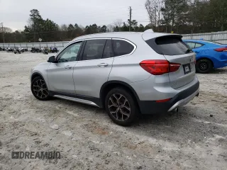 2020 BMW X1 xDrive28i with VIN WBXJG9C05L5P76067, listed as a Copart auction lot 40635893 with 57,184 mi miles. Bid and sale history available at carsss.com. Image 2.