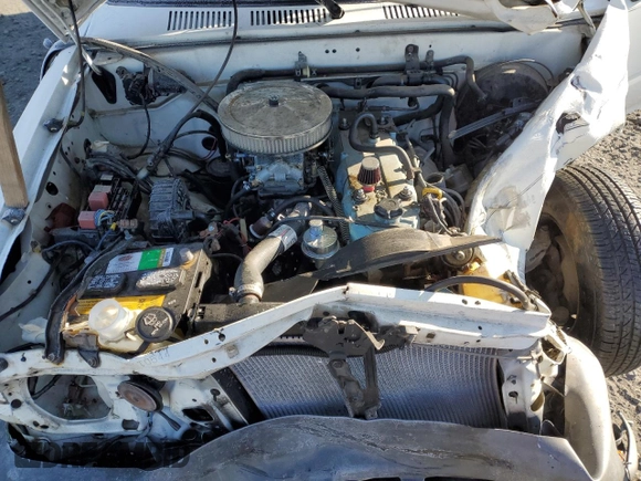 1990 Toyota Pickup with VIN JT4RN81R1L0049863, listed as a Copart auction lot 42832405 with 230,913 mi miles and Salvage title. Bid and sale history available at DreamBid. Image 13.
