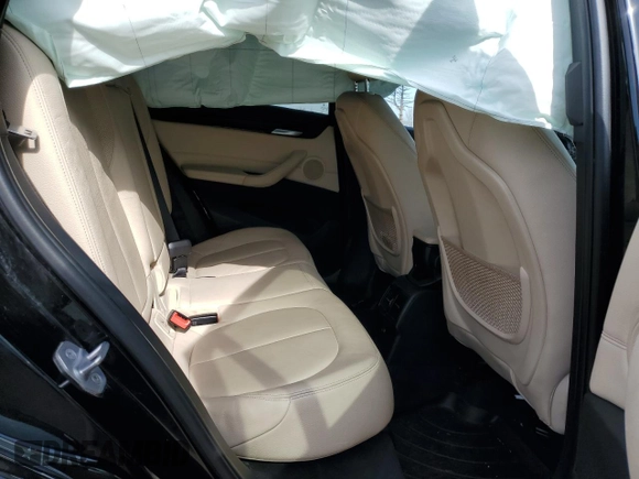 2018 BMW X1 xDrive28i with VIN WBXHT3C31J5K25021, listed as a Copart auction lot 48779555 with 71,741 mi miles and Salvage Title. Bid and sale history available at carsss.com. Image 11.