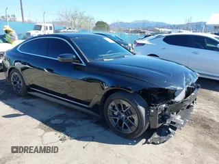 2024 BMW i4 eDrive35 z VIN WBY43AW01RFS94328, wystawiony jako IAAI lot #41734039 z przebiegiem 8959 mil mil oraz . Historia ofert i sprzedaży dostępna na DreamBid. Obrazek 1.