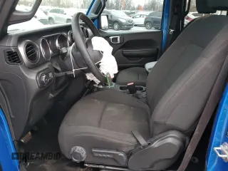 2023 Jeep Wrangler Sport S with VIN 1C4HJXDG9PW543144, listed as a Copart auction lot 43745495 with 36,989 mi miles and Salvage Title. Bid and sale history available at DreamBid. Image 7.
