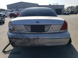 2003 Ford Police Interceptor Street Appear with VIN 2FAFP71WX3X110275, listed as a Copart auction lot 44157665 with 275,661 mi miles and Salvage title. Bid and sale history available at DreamBid. Image 6.