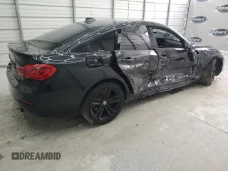 2018 BMW 4 Series 440i with VIN WBA4J5C59JBF07309, listed as a Copart auction lot 74893994 with 89,054 mi miles and Salvage Title. Bid and sale history available at DreamBid. Image 3.