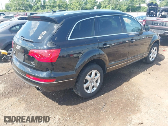 2015 Audi Q7 Premium with VIN WA1CGAFEXFD017935, listed as a IAAI auction lot 42549490 with 170,271 mi miles and . Bid and sale history available at DreamBid. Image 4.