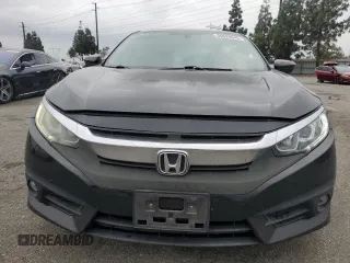 2016 Honda Civic EX-T z VIN 2HGFC1F33GH634029, wystawiony jako Copart lot #56026045 z przebiegiem 168 676 mil mil oraz Szkoda całkowita • Salvage title. Historia ofert i sprzedaży dostępna na DreamBid. Obrazek 5.