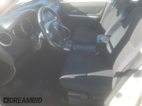2006 Suzuki Grand Vitara z VIN JS3TE941364101882, wystawiony jako Copart lot #84143364 z przebiegiem 148 560 mil mil oraz Szkody całkowita. Historia ofert i sprzedaży dostępna na DreamBid. Obrazek 7.
