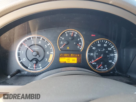 2015 Nissan Armada SV z VIN 5N1BA0ND8FN616053, wystawiony jako Copart lot #88253385 z przebiegiem 211 004 mil mil oraz Szkoda całkowita • Salvage title. Historia ofert i sprzedaży dostępna na DreamBid. Obrazek 9.