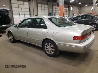 2000 Toyota Camry CE z VIN JT2BG22K1Y0483646, wystawiony jako Copart lot #53129705 z przebiegiem 187 418 mil mil oraz Szkoda całkowita • Salvage title. Historia ofert i sprzedaży dostępna na DreamBid. Obrazek 2.
