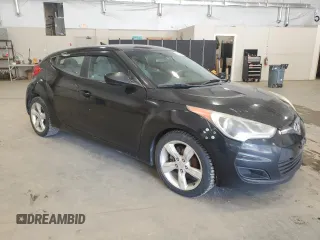 2012 Hyundai Veloster w/Black Int z VIN KMHTC6AD6CU043856, wystawiony jako Copart lot #53052335 z przebiegiem 170 035 mil mil oraz Czysty tytuł • Clean title. Historia ofert i sprzedaży dostępna na DreamBid. Obrazek 4.
