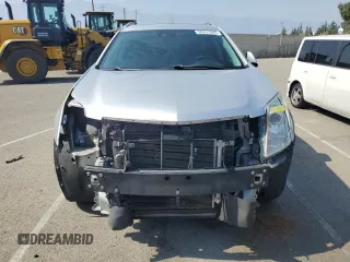 2013 Cadillac SRX Performance Collection z VIN 3GYFNDE38DS561321, wystawiony jako Copart lot #60237605 z przebiegiem 120 404 mil mil oraz Szkoda całkowita • Salvage title. Historia ofert i sprzedaży dostępna na DreamBid. Obrazek 5.