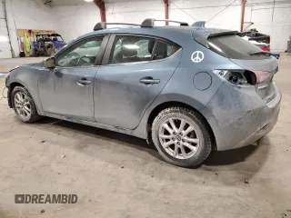 2014 Mazda 3 i Grand Touring with VIN JM1BM1M71E1216354, listed as a Copart auction lot 42301285 with 124,873 mi miles and Salvage Title. Bid and sale history available at DreamBid. Image 2.