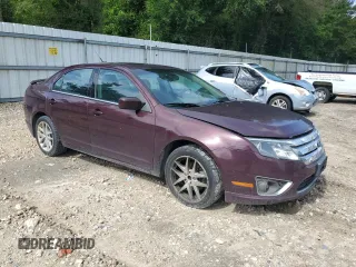 2012 Ford Fusion SEL with VIN 3FAHP0JG3CR411445, listed as a Copart auction lot 60745575 with 209,421 mi miles and Salvage title. Bid and sale history available at DreamBid. Image 4.