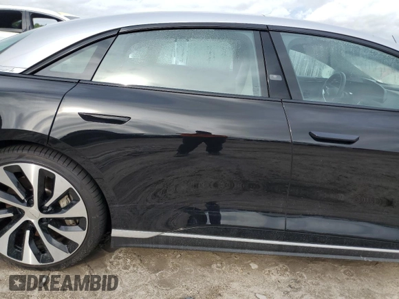 2022 Lucid Air Grand Touring z VIN 50EA1GBA6NA001280, wystawiony jako Copart lot #74004994 z przebiegiem Nie podano mil oraz Szkody całkowita. Historia ofert i sprzedaży dostępna na DreamBid. Obrazek 10.