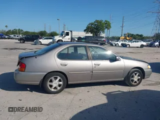 1999 Nissan Altima XE with VIN 1N4DL01D1XC255927, listed as a IAAI auction lot 42003101 with 154,000 mi miles. Bid and sale history available at carsss.com. Image 13.