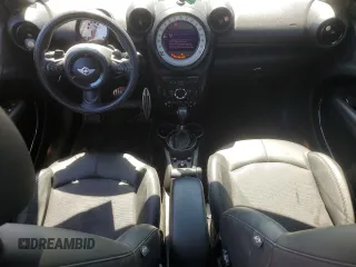 2013 MINI Countryman S ALL4 z VIN WMWZC5C54DWP34353, wystawiony jako Copart lot #57059295 z przebiegiem 154 012 mil mil oraz Szkoda całkowita • Salvage title. Historia ofert i sprzedaży dostępna na DreamBid. Obrazek 8.