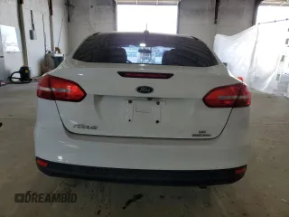 2016 Ford Focus SE z VIN 1FADP3F26GL404670, wystawiony jako Copart lot #52876095 z przebiegiem 80 425 mil mil oraz Szkoda całkowita • Salvage title. Historia ofert i sprzedaży dostępna na DreamBid. Obrazek 6.