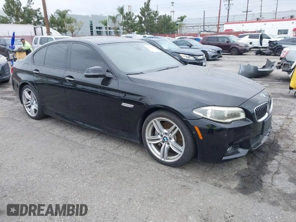 2015 BMW 5 Series 535i with VIN WBA5B1C55FG128387, listed as a IAAI auction lot 41885806 with 94,734 mi miles and . Bid and sale history available at carsss.com. Image 1.