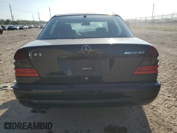 1999 Mercedes-Benz C z VIN WDBHA33E5XF777031, wystawiony jako Copart lot #57914774 z przebiegiem Nie podano mil oraz Szkoda całkowita • Salvage title. Historia ofert i sprzedaży dostępna na DreamBid. Obrazek 6.
