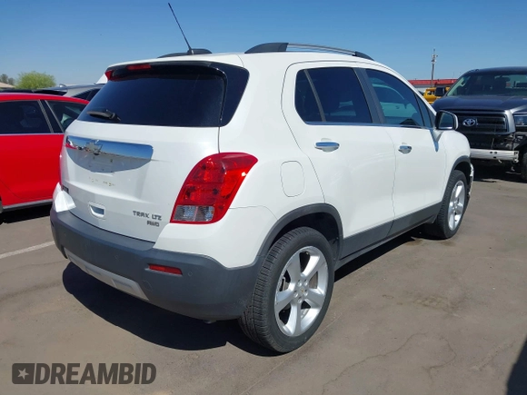 2015 Chevrolet Trax LTZ with VIN KL7CJTSBXFB236823, listed as a IAAI auction lot 42045817 with 138,930 mi miles. Bid and sale history available at carsss.com. Image 4.