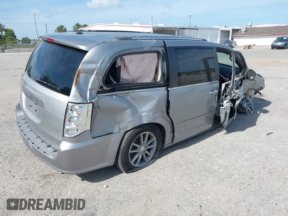 2014 Dodge Grand Caravan SXT with VIN 2C4RDGCG3ER193688, listed as a IAAI auction lot 41290544 with 73,092 mi miles and . Bid and sale history available at DreamBid. Image 4.