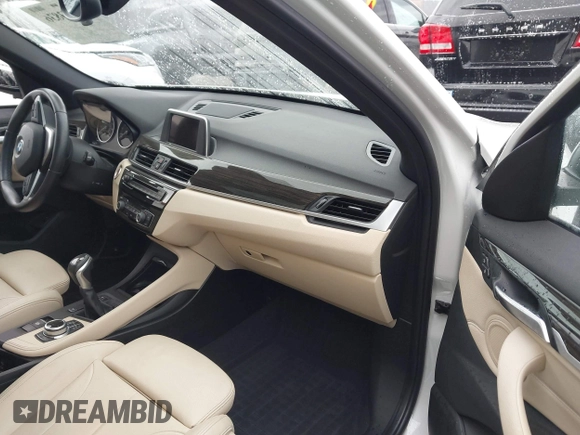 2017 BMW X1 xDrive28i with VIN WBXHT3C36H5F74818, listed as a IAAI auction lot 41853836 with 71,735 mi miles and . Bid and sale history available at DreamBid. Image 5.