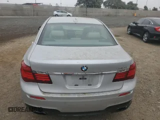 2013 BMW 7 Series 740i with VIN WBAYA6C53DD143952, listed as a Copart auction lot 76064454 with 119,896 mi miles and Clean Title. Bid and sale history available at carsss.com. Image 6.
