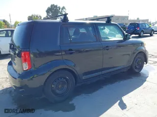 2012 Scion xB with VIN JTLZE4FE4C1143412, listed as a IAAI auction lot 42091929 with 213,501 mi miles. Bid and sale history available at carsss.com. Image 4.