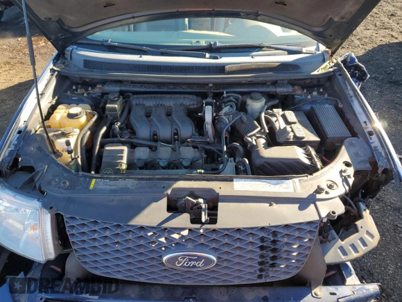 2005 Ford Freestyle SEL z VIN 1FMZK05105GA60308, wystawiony jako Copart lot #80125474 z przebiegiem Nie podano mil oraz Szkoda całkowita • Salvage title. Historia ofert i sprzedaży dostępna na DreamBid. Obrazek 11.