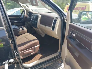 2013 Ram 1500 SLT z VIN 1C6RR6LG8DS545809, wystawiony jako IAAI lot #42013194 z przebiegiem 154 603 mil mil oraz . Historia ofert i sprzedaży dostępna na DreamBid. Obrazek 5.