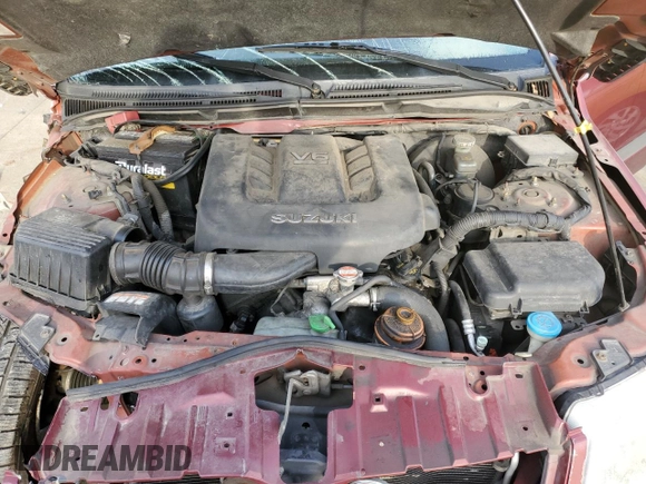 2006 Suzuki Grand Vitara Premium with VIN JS3TD943764101565, listed as a Copart auction lot 84473074 with 174,257 mi miles and Salvage title. Bid and sale history available at DreamBid. Image 13.