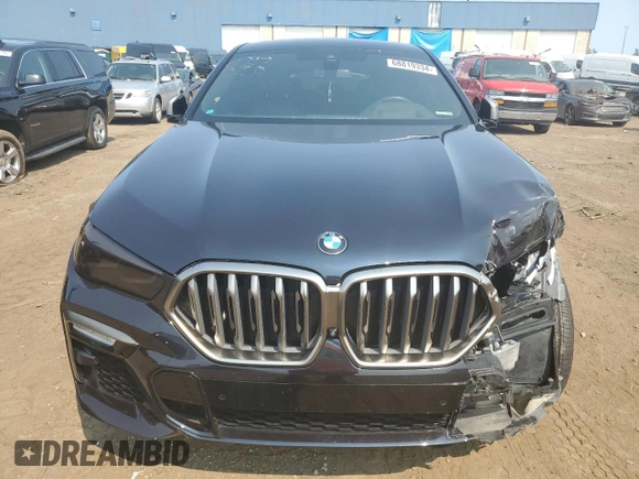 2021 BMW X6 M50i with VIN 5UXCY8C04M9E36899, listed as a Copart auction lot 68819334 with 72,808 mi miles and Salvage Title. Bid and sale history available at carsss.com. Image 5.