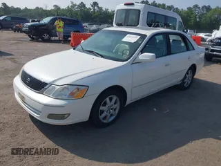 2000 Toyota Avalon XL z VIN 4T1BF28B2YU102103, wystawiony jako IAAI lot #42441529 z przebiegiem 256 568 mil mil oraz . Historia ofert i sprzedaży dostępna na DreamBid. Obrazek 2.