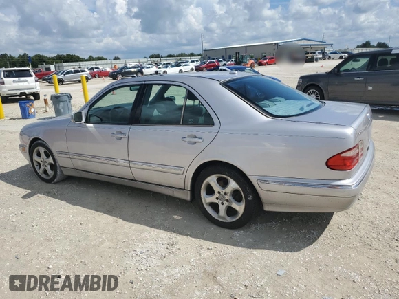 2002 Mercedes-Benz E-Class with VIN WDBJF65J02B495961, listed as a Copart auction lot 73844554 with 99,380 mi miles and Salvage Title. Bid and sale history available at carsss.com. Image 2.