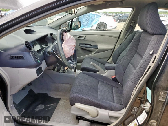 2010 Honda Insight EX z VIN JHMZE2H72AS038002, wystawiony jako Copart lot #58484365 z przebiegiem 178 670 mil mil oraz Szkoda całkowita • Salvage title. Historia ofert i sprzedaży dostępna na DreamBid. Obrazek 7.