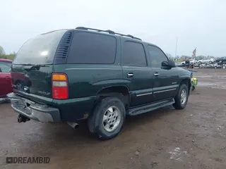2002 Chevrolet Tahoe LT with VIN 1GNEK13Z22J154097, listed as a IAAI auction lot 41913119 with 243,978 mi miles. Bid and sale history available at carsss.com. Image 4.