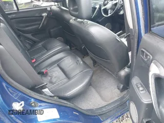 2005 Toyota RAV4 with VIN JTEHD20V656038833, listed as a IAAI auction lot 41861809 with 291,247 mi miles. Bid and sale history available at carsss.com. Image 8.