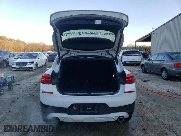 2019 BMW X2 xDrive28i with VIN WBXYJ5C55K5N11085, listed as a Copart auction lot 82306064 with 69,578 mi miles and Salvage Title. Bid and sale history available at carsss.com. Image 6.