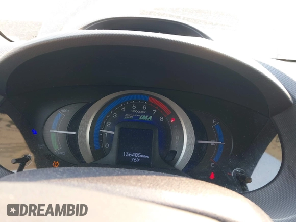2010 Honda Insight EX with VIN JHMZE2H75AS027964, listed as a IAAI auction lot 41889301 with 136,485 mi miles and . Bid and sale history available at DreamBid. Image 7.