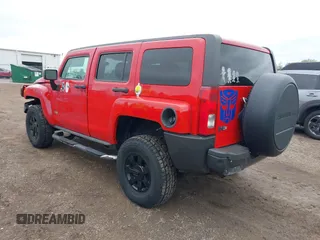 2007 Hummer H3 SUV with VIN 5GTDN13E978240989, listed as a IAAI auction lot 42169980 with 136,129 mi miles. Bid and sale history available at carsss.com. Image 3.