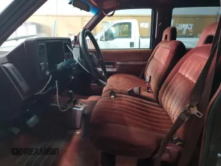 1994 Chevrolet Suburban with VIN 1GNFK16K5RJ382205, listed as a Copart auction lot 77995064 with 294,600 mi miles and Clean Title. Bid and sale history available at carsss.com. Image 7.
