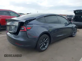 2022 Tesla Model 3 Long Range with VIN 5YJ3E1EB9NF164774, listed as a IAAI auction lot 41915755 with 39,625 mi miles and . Bid and sale history available at DreamBid. Image 4.