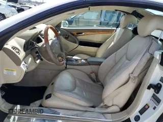 2008 Mercedes-Benz SL 550 with VIN WDBSK71FX8F141776, listed as a Copart auction lot 50004185 with 58,668 mi miles and Salvage title. Bid and sale history available at DreamBid. Image 7.