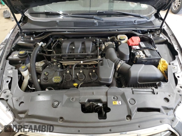 2017 Ford Taurus Limited z VIN 1FAHP2F81HG111818, wystawiony jako Copart lot #50169665 z przebiegiem 122 018 mil mil oraz Szkoda całkowita • Salvage title. Historia ofert i sprzedaży dostępna na DreamBid. Obrazek 11.