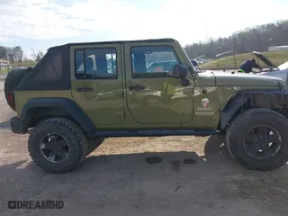 2013 Jeep Wrangler Unlimited Sport with VIN 1C4BJWDG5DL577949, listed as a IAAI auction lot 41837172 with 142,235 mi miles. Bid and sale history available at carsss.com. Image 13.