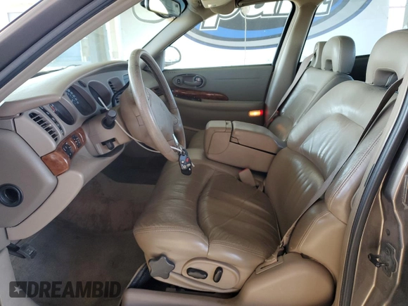 2000 Buick LeSabre Limited z VIN 1G4HR54KXYU139070, wystawiony jako Copart lot #61306035 z przebiegiem 183 354 mil mil oraz Czysty tytuł • Clean title. Historia ofert i sprzedaży dostępna na DreamBid. Obrazek 7.